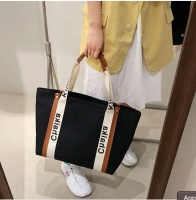 1705221883835.jpg - กระเป๋าผ้าแคนวาส Oversize พิมพ์โลโก้ตามสั่ง | https://begroove.co.th
